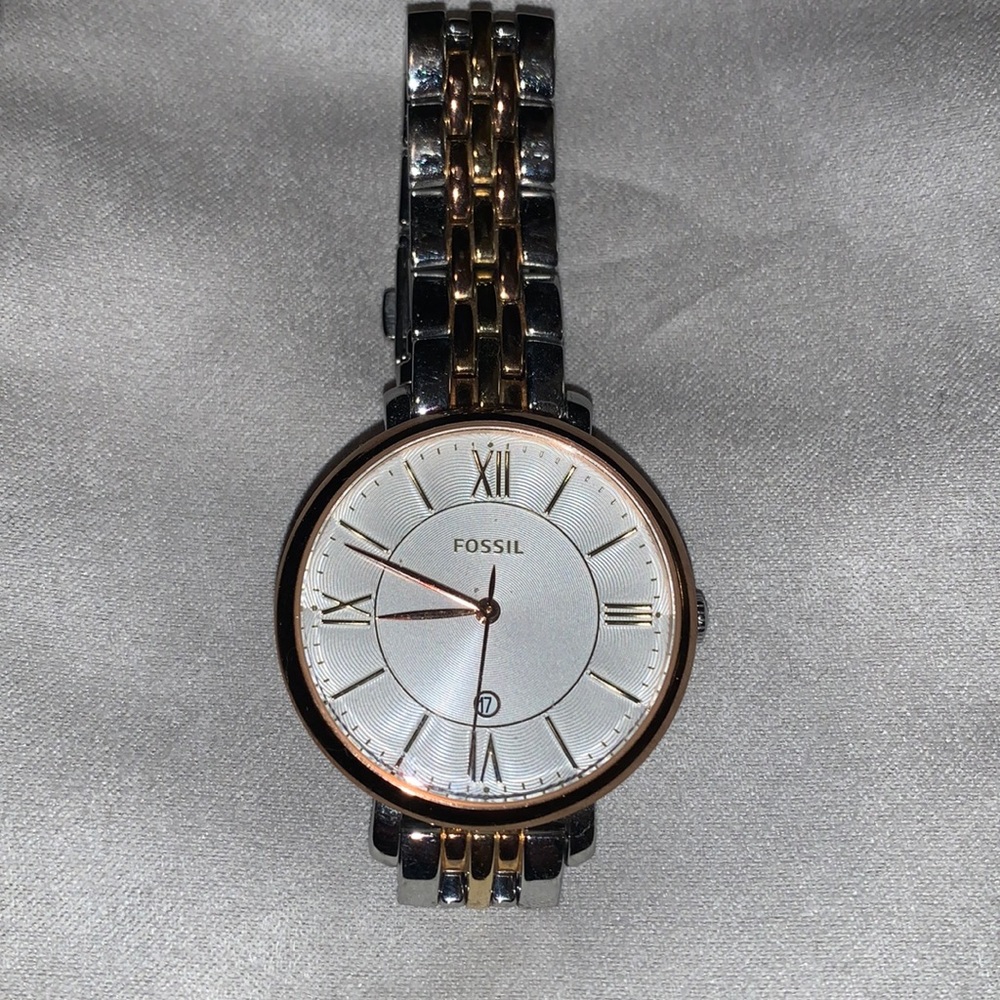 Silver and rose gold medal fossil watch
